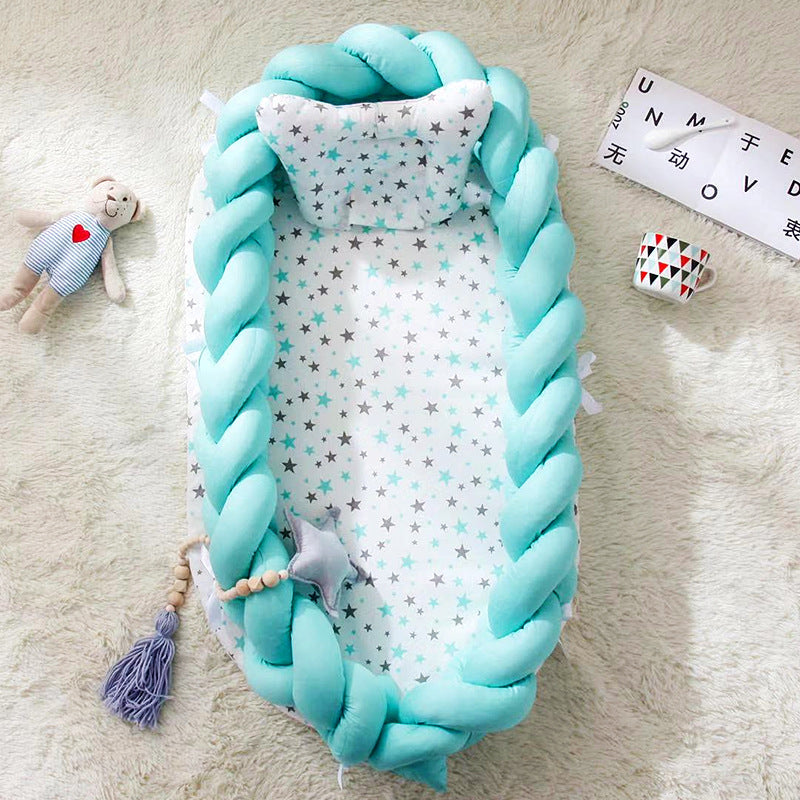 Hemei cotton woven portable baby pillow bed mid-bed bionic detachable and washable baby nest three-dimensional protective baby bed