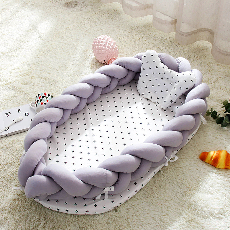 Hemei cotton woven portable baby pillow bed mid-bed bionic detachable and washable baby nest three-dimensional protective baby bed