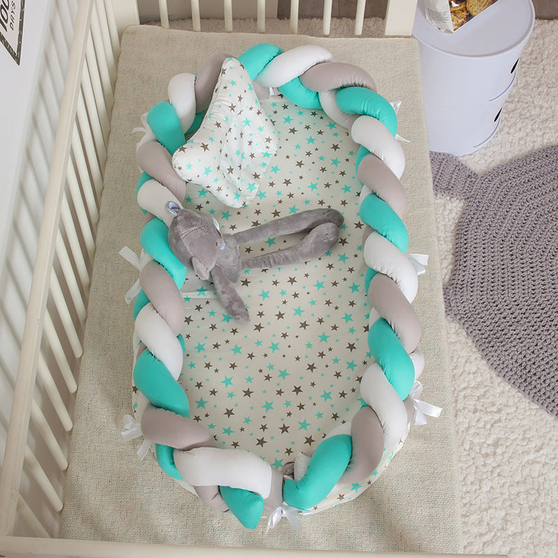 Hemei cotton woven portable baby pillow bed mid-bed bionic detachable and washable baby nest three-dimensional protective baby bed