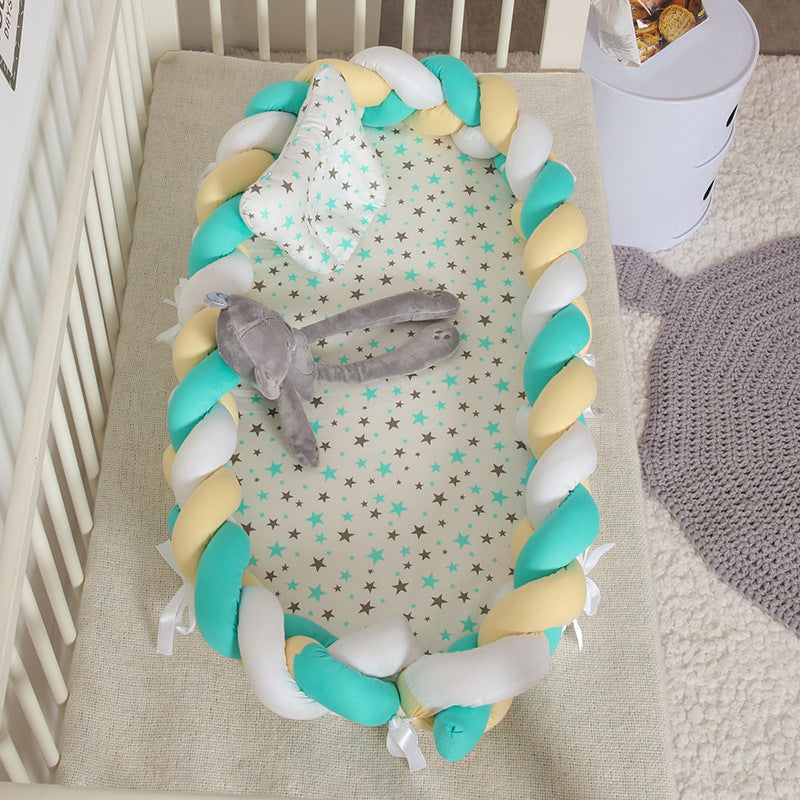 Hemei cotton woven portable baby pillow bed mid-bed bionic detachable and washable baby nest three-dimensional protective baby bed