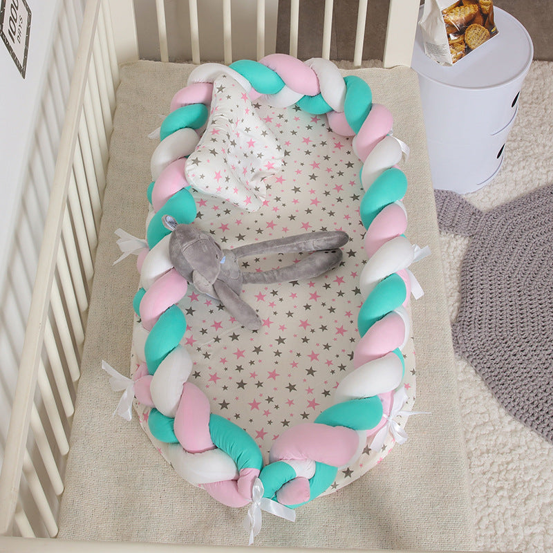 Hemei cotton woven portable baby pillow bed mid-bed bionic detachable and washable baby nest three-dimensional protective baby bed