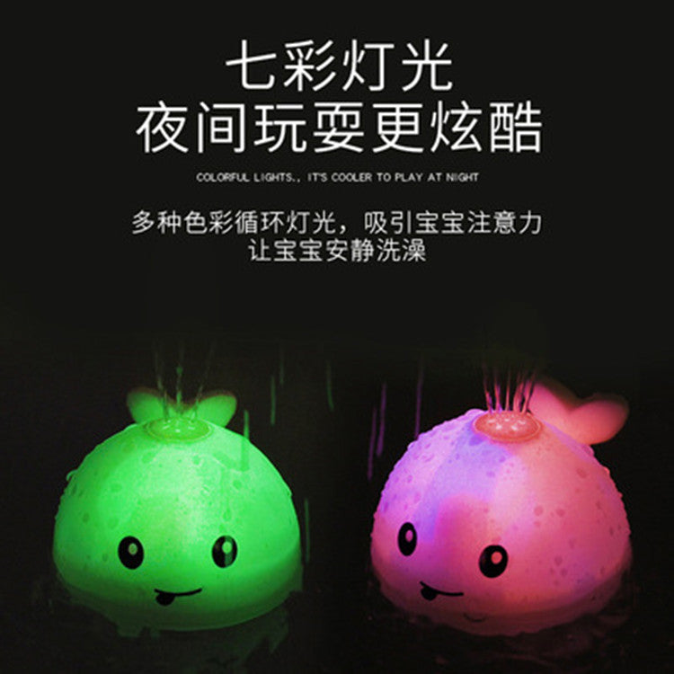 Cross-border hot sale electric little whale induction water jet light universal music stall swimming baby bath toy