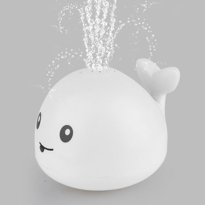 Cross-border hot sale electric little whale induction water jet light universal music stall swimming baby bath toy