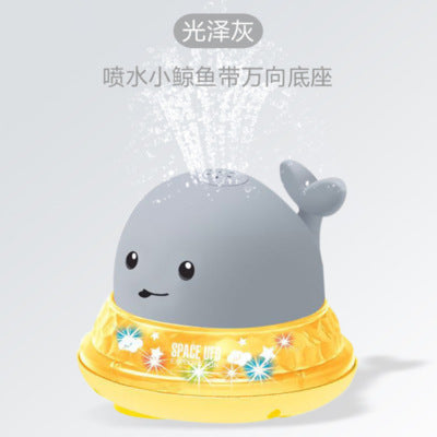 Cross-border hot sale electric little whale induction water jet light universal music stall swimming baby bath toy