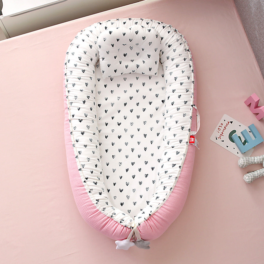 Hemei honeycomb breathable detachable and washable portable baby bed mid-bed bionic baby nest baby pillow travel baby bed