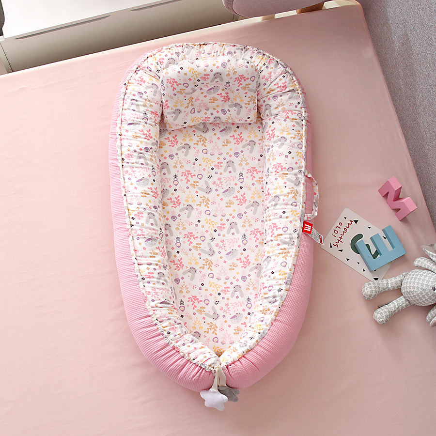 Hemei honeycomb breathable detachable and washable portable baby bed mid-bed bionic baby nest baby pillow travel baby bed