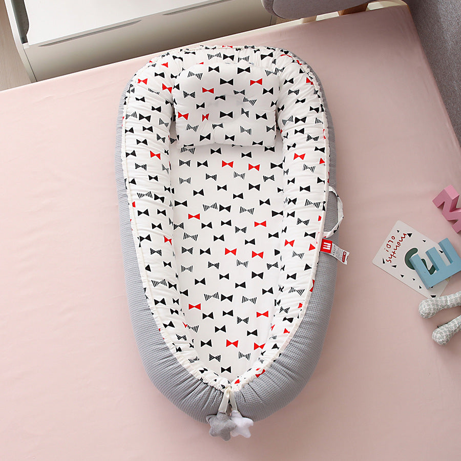 Hemei honeycomb breathable detachable and washable portable baby bed mid-bed bionic baby nest baby pillow travel baby bed