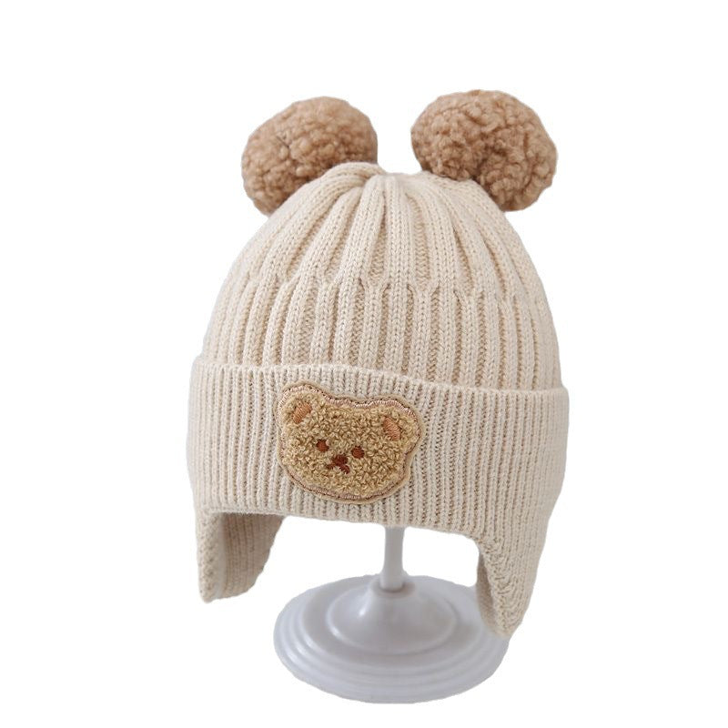 New autumn and winter children's warm hats cute bear double ball hats infant baby warm ear protection knitted wool hat