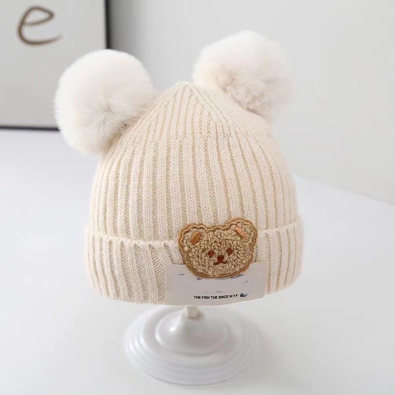 New autumn and winter children's warm hats cute bear double ball hats infant baby warm ear protection knitted wool hat