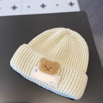 New autumn and winter children's warm hats cute bear double ball hats infant baby warm ear protection knitted wool hat