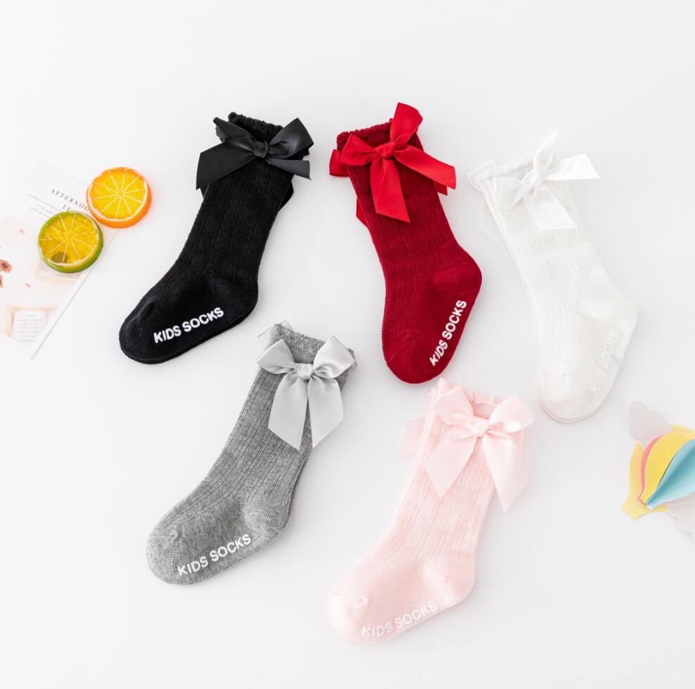 New style boys and girls solid color striped stockings Polyester cotton non-slip bubble mouth baby bowknot mid-tube socks wholesale