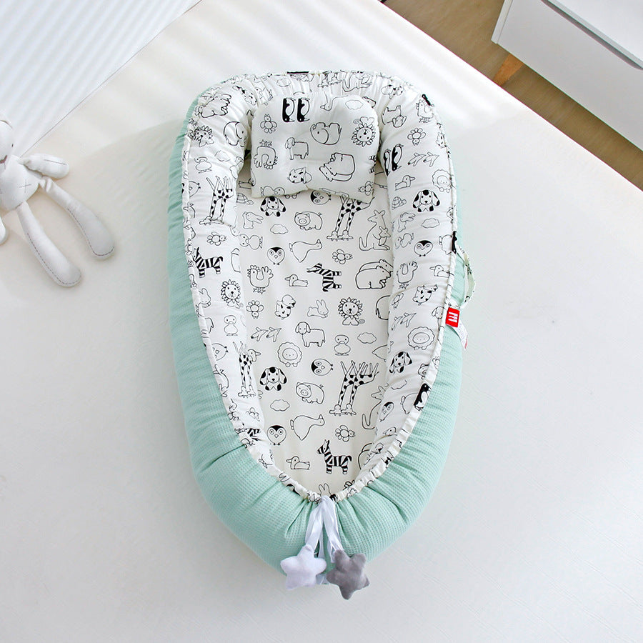 Hemei honeycomb breathable detachable and washable portable baby bed mid-bed bionic baby nest baby pillow travel baby bed