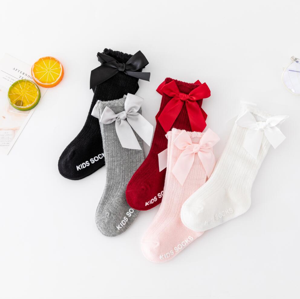 New style boys and girls solid color striped stockings Polyester cotton non-slip bubble mouth baby bowknot mid-tube socks wholesale