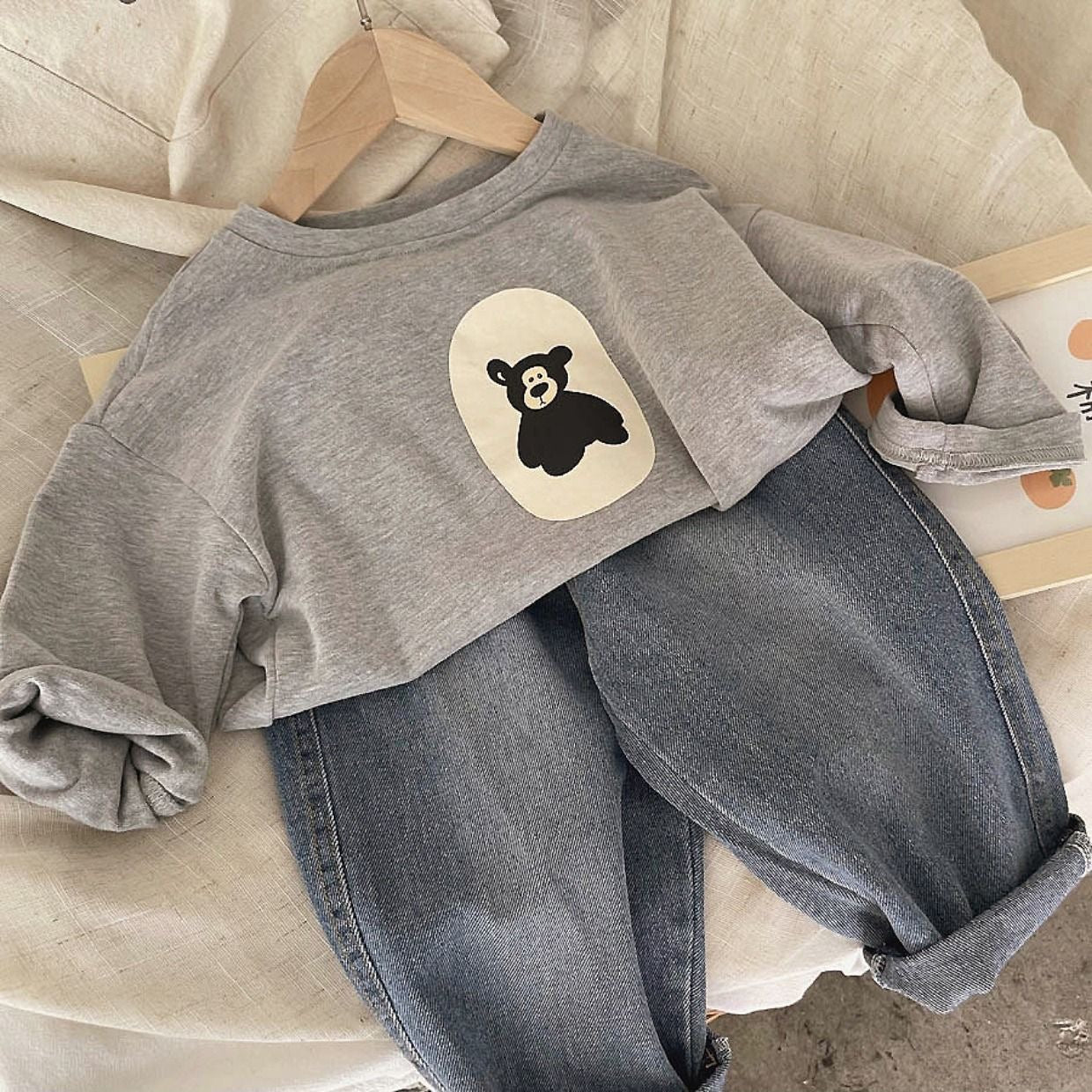 Children's spring and autumn clothes 2025 new cartoon round neck long-sleeved T-shirt casual Korean version of boys and girls baby pure cotton bottoming shirt