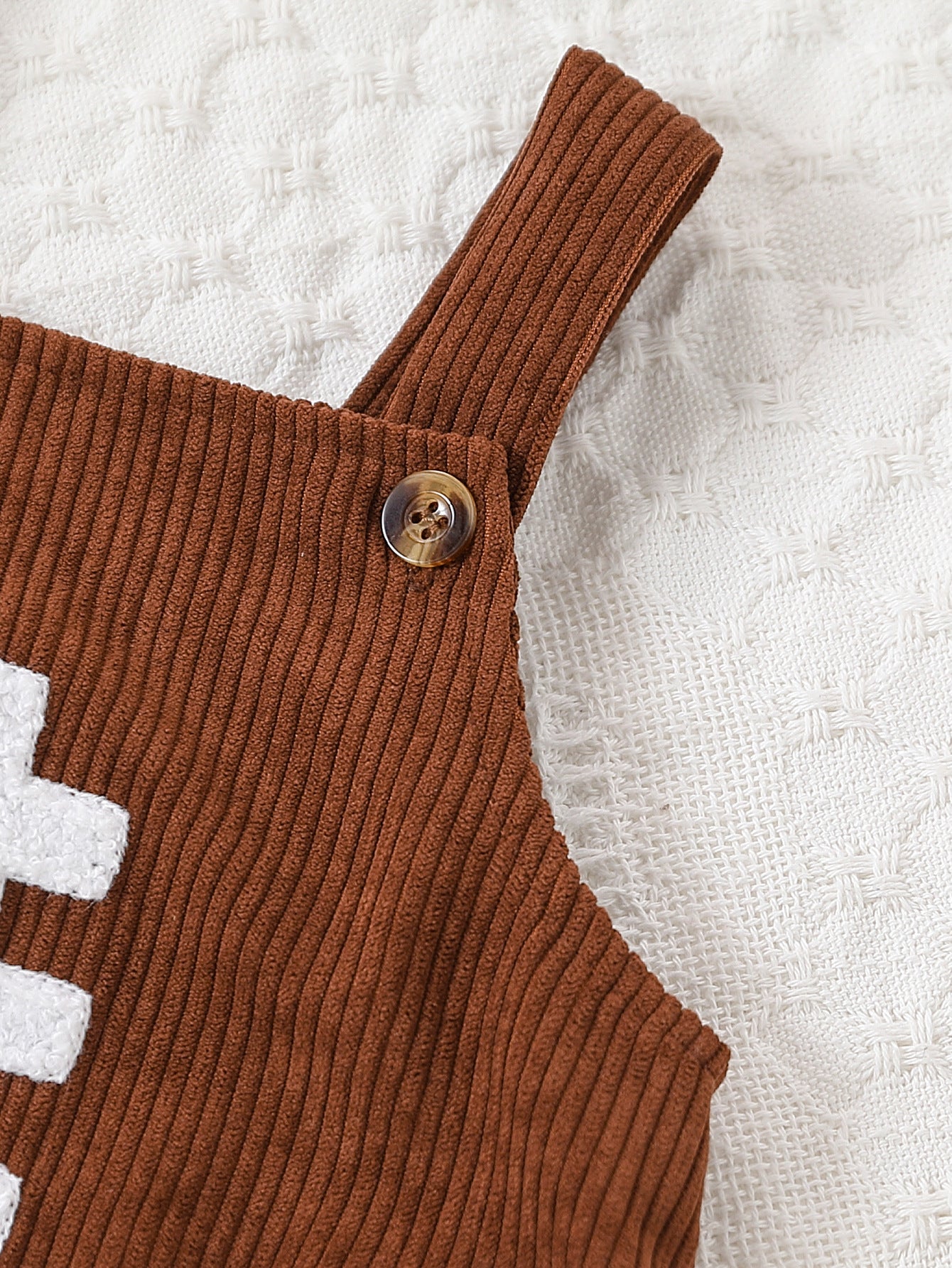 New spring and autumn baby boys and girls corduroy sling rugby embroidered triangle jumpsuit romper crawling clothes