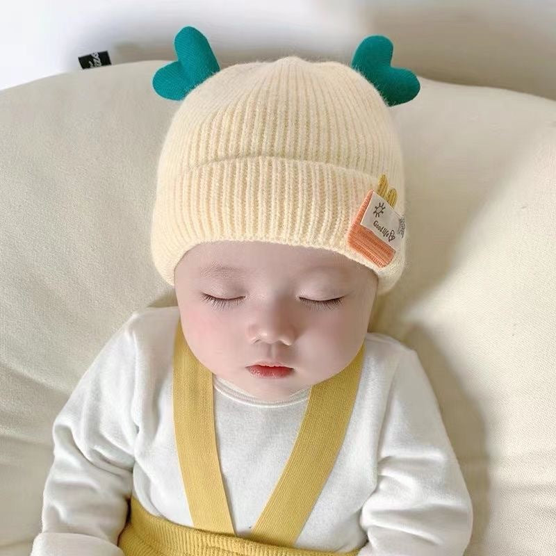 New autumn and winter children's warm hats cute bear double ball hats infant baby warm ear protection knitted wool hat