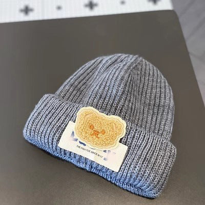 New autumn and winter children's warm hats cute bear double ball hats infant baby warm ear protection knitted wool hat